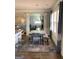 Open dining area with adjacent views of the kitchen and living spaces at 160 Elysian Dr, Fayetteville, GA 30214