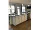 Spacious kitchen island features granite countertops and stainless steel dishwasher, ideal for modern living at 160 Elysian Dr, Fayetteville, GA 30214