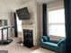 Relaxing living area featuring a fireplace and calming color palette at 160 Elysian Dr, Fayetteville, GA 30214