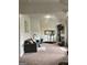 Relaxing living area featuring a fireplace, exercise area, and calming color palette at 160 Elysian Dr, Fayetteville, GA 30214