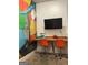 Study room featuring a built-in desk, playful artwork, and comfortable seating at 160 Elysian Dr, Fayetteville, GA 30214
