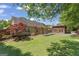 View of backyard featuring a covered patio and detached building at 421 Bear Cub Path, Social Circle, GA 30025