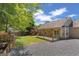 Spacious backyard featuring a covered patio at 421 Bear Cub Path, Social Circle, GA 30025