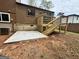 Backyard with patio and new wood deck with steps to the backyard at 862 Bridgewater Ct, Stone Mountain, GA 30088