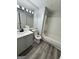 Bathroom with a vanity, toilet, and shower-tub combo at 862 Bridgewater Ct, Stone Mountain, GA 30088