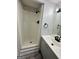 Bathroom features modern fixtures, a new vanity, and a tiled shower with updated plumbing at 862 Bridgewater Ct, Stone Mountain, GA 30088