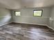 Bedroom features new paint and updated vinyl floors with natural light at 862 Bridgewater Ct, Stone Mountain, GA 30088