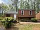 Charming two-story home with a welcoming front yard and wood accents at 862 Bridgewater Ct, Stone Mountain, GA 30088