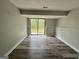 The living room boasts a sliding glass door that opens to a green backyard at 862 Bridgewater Ct, Stone Mountain, GA 30088