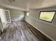 The living room features new paint and vinyl floors with natural light at 862 Bridgewater Ct, Stone Mountain, GA 30088