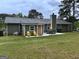Backyard view featuring a patio with outdoor seating, ideal for entertaining and enjoying outdoor living at 140 Stoneview Cir, Covington, GA 30016