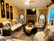 Inviting living room featuring a brick fireplace, plush seating, and stylish decor at 140 Stoneview Cir, Covington, GA 30016