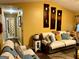 Cozy living room featuring an entryway, comfortable seating, and warm, inviting decor at 140 Stoneview Cir, Covington, GA 30016