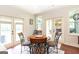 Cozy breakfast nook with access to outdoor area and a view of the kitchen and living room at 145 Carrington Ln, Brooks, GA 30205