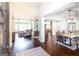 Grand foyer with hardwood floors, high ceilings, and a seamless transition to the living and dining areas at 145 Carrington Ln, Brooks, GA 30205