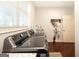Modern laundry room features a sink with granite countertop and LG washer dryer at 145 Carrington Ln, Brooks, GA 30205