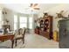 Office space features a desk, ceiling fan, a safe, and mounted decoratives at 145 Carrington Ln, Brooks, GA 30205
