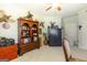Spacious office features a large safe, a bookshelf, and decoratives at 145 Carrington Ln, Brooks, GA 30205