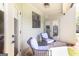 Covered patio with outdoor seating, and access to the home and surrounding landscape at 145 Carrington Ln, Brooks, GA 30205