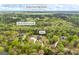 Aerial view showing home, location of Walnut Grove High School and Center Hill Church Rd at 2351 Rabbit Farm Cir, Loganville, GA 30052