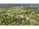 Loganville, GA property featuring beautiful treeline and mature landscaping at 2351 Rabbit Farm Cir, Loganville, GA 30052