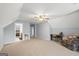 Inviting bedroom with neutral carpet and gray walls offers ample space at 2351 Rabbit Farm Cir, Loganville, GA 30052