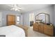 Bedroom showcases furniture, carpet flooring, and access to the bathroom at 2351 Rabbit Farm Cir, Loganville, GA 30052