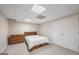 Cozy bedroom with carpeted floor, a simple bed, and a wooden dresser and closet at 2351 Rabbit Farm Cir, Loganville, GA 30052