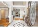 Grand foyer with marble floors, a staircase, and an open view to the living spaces at 2351 Rabbit Farm Cir, Loganville, GA 30052