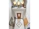Grand foyer features decorative tile flooring, chandelier, and beautiful wood front door at 2351 Rabbit Farm Cir, Loganville, GA 30052