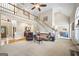Spacious living room showcasing staircase, fireplace, and hardwood flooring under neutral decor at 2351 Rabbit Farm Cir, Loganville, GA 30052