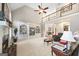 Living room with fireplace, vaulted ceilings, built-in shelving and balcony overlooking open floor plan at 2351 Rabbit Farm Cir, Loganville, GA 30052