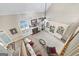 Aerial view of the living room with a fireplace, built-ins, and plenty of natural light at 2351 Rabbit Farm Cir, Loganville, GA 30052