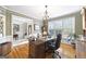 Charming office featuring hardwood floors, large windows, and custom wood finishes at 2351 Rabbit Farm Cir, Loganville, GA 30052
