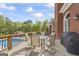 Outdoor patio with comfortable seating, grill, and a view of the pool at 2351 Rabbit Farm Cir, Loganville, GA 30052