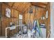 Pool shed interior with a filter and a water hose at 2351 Rabbit Farm Cir, Loganville, GA 30052