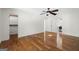 Bright bedroom with ceiling fan and hardwood floors at 180 Paces Dr, Fayetteville, GA 30215