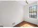 Bedroom with hardwood floors and a window, providing a bright and inviting atmosphere at 180 Paces Dr, Fayetteville, GA 30215