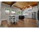 Spacious kitchen with modern appliances, an island, and a dining area at 4383 Pool Rd, Winston, GA 30187