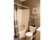 Bathroom with a white tub and shower combination, neutral wall colors, and matching fixtures at 206 Pine Cedar Cir, Brooks, GA 30205