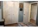 Bedroom features a bi-fold door closet and an additional door leading to another room at 206 Pine Cedar Cir, Brooks, GA 30205