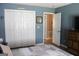 Bedroom featuring a double-door closet and an open doorway at 206 Pine Cedar Cir, Brooks, GA 30205