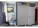 Bedroom features a double-door closet and a decorative shelf at 206 Pine Cedar Cir, Brooks, GA 30205