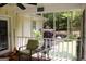 Cozy screened in porch with view of landscaped backyard at 206 Pine Cedar Cir, Brooks, GA 30205