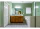 Bathroom with double vanity, soaking tub, shower, and tiled floors at 327 Viceroy Curv, Stockbridge, GA 30281