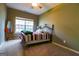 Bedroom with carpet, ceiling fan, window and mirror at 327 Viceroy Curv, Stockbridge, GA 30281