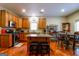 Well-lit kitchen boasts stainless steel appliances, granite countertops, and a cozy breakfast nook at 327 Viceroy Curv, Stockbridge, GA 30281