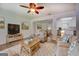 Comfortable living space offering open floor plan with view of kitchen and dining areas at 6950 Shannon Dr, Lithia Springs, GA 30122