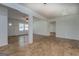 Spacious living area with open floor plan and wood look floors at 6950 Shannon Dr, Lithia Springs, GA 30122