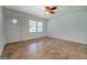 Inviting living space showcases wood-look flooring, a front door and natural light at 6950 Shannon Dr, Lithia Springs, GA 30122